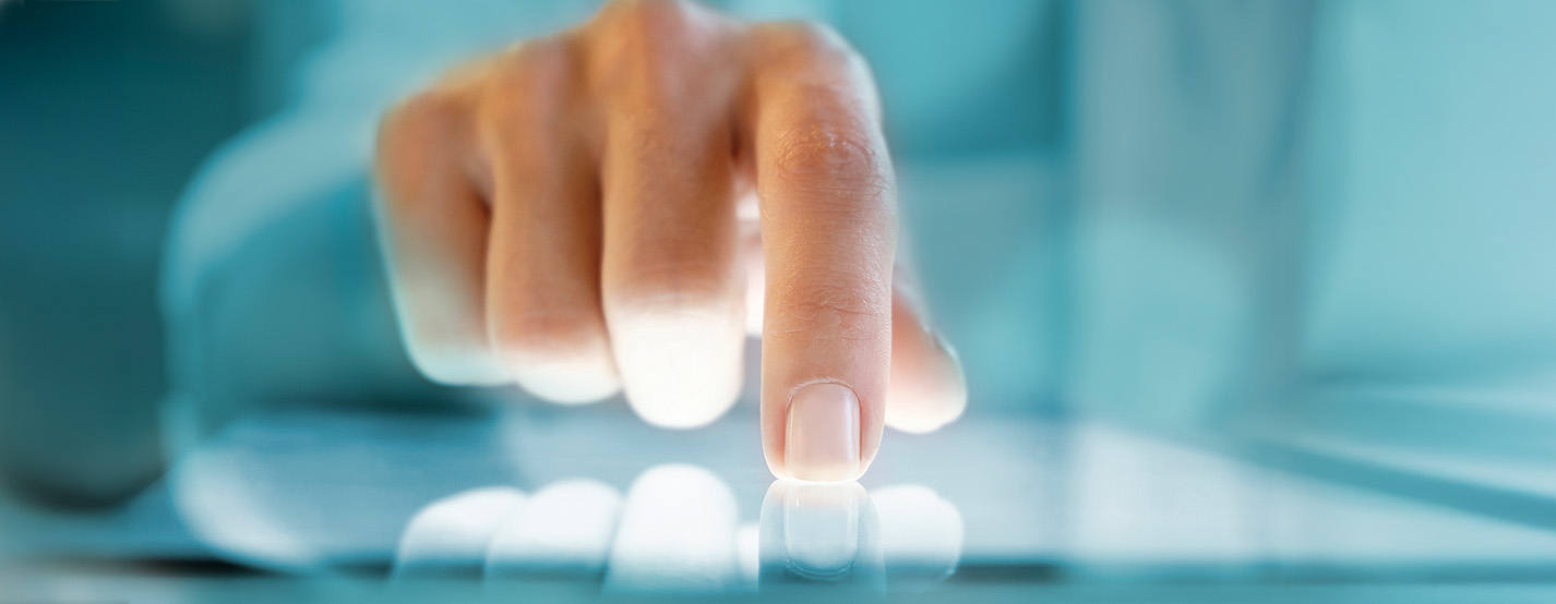 Closeup photo of a hand touching a digital screen
